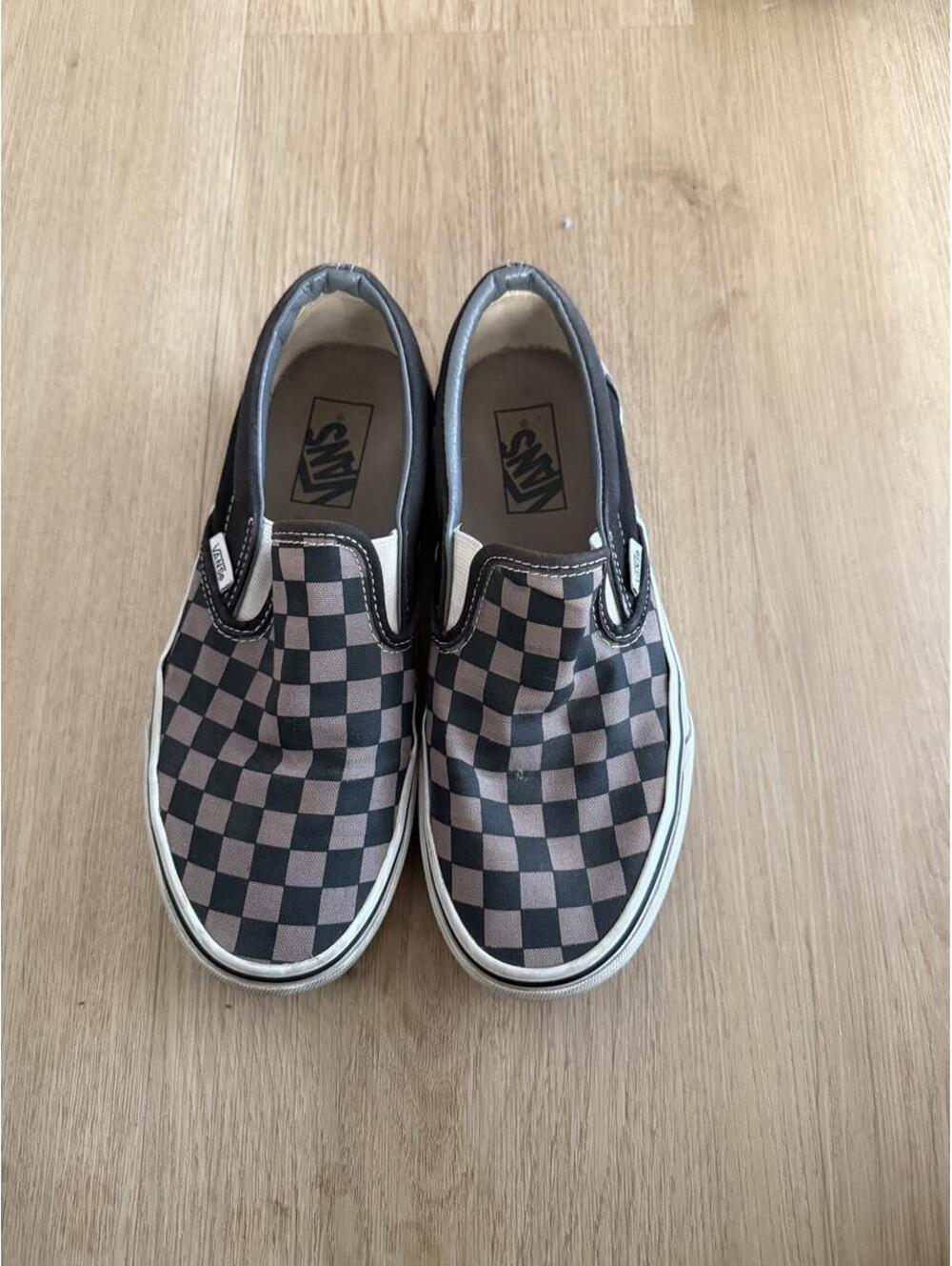 Vans black and brown checkerboard slip-on sneakers